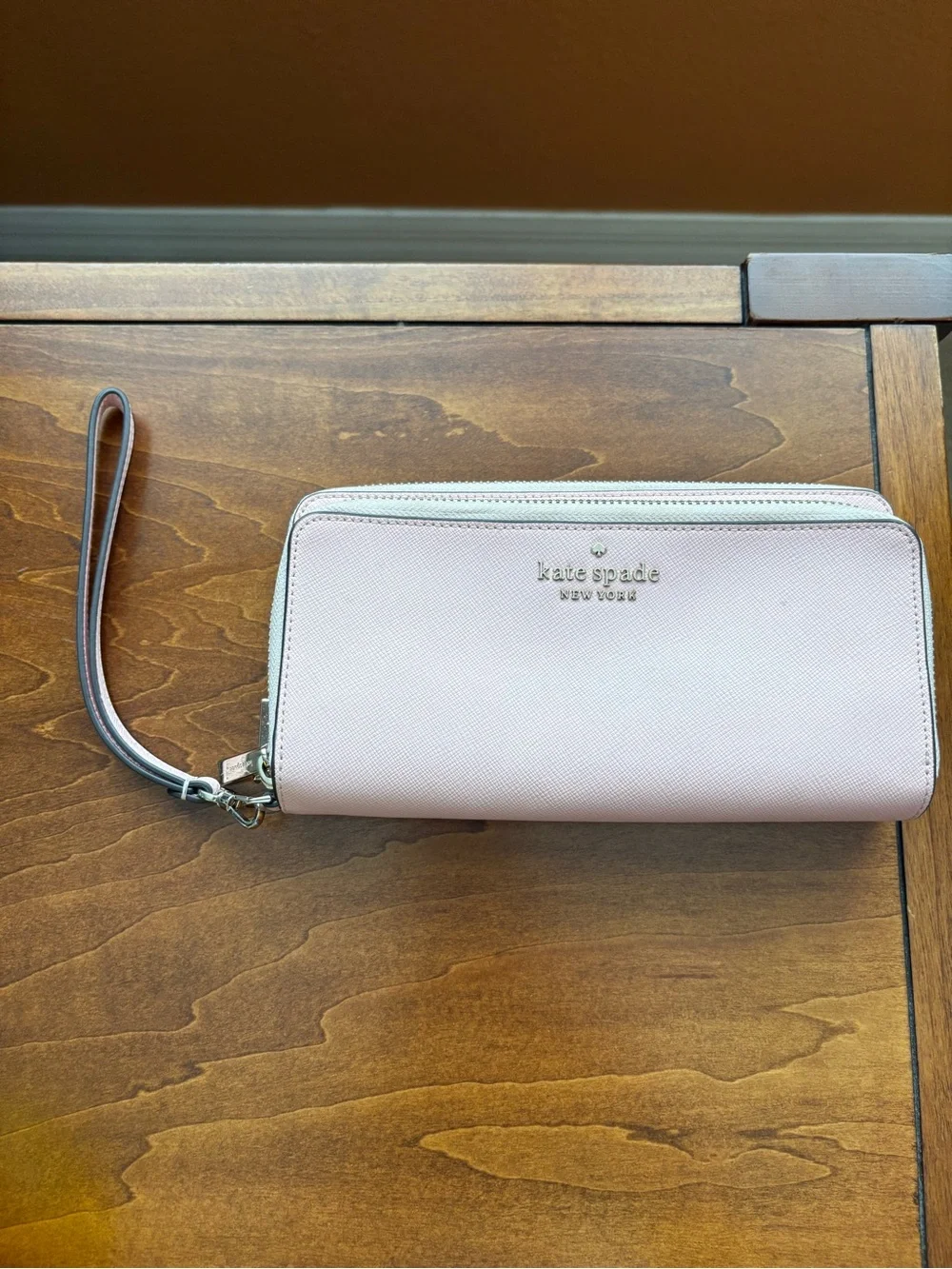 kate spade light pink zip-around wristlet wallet
